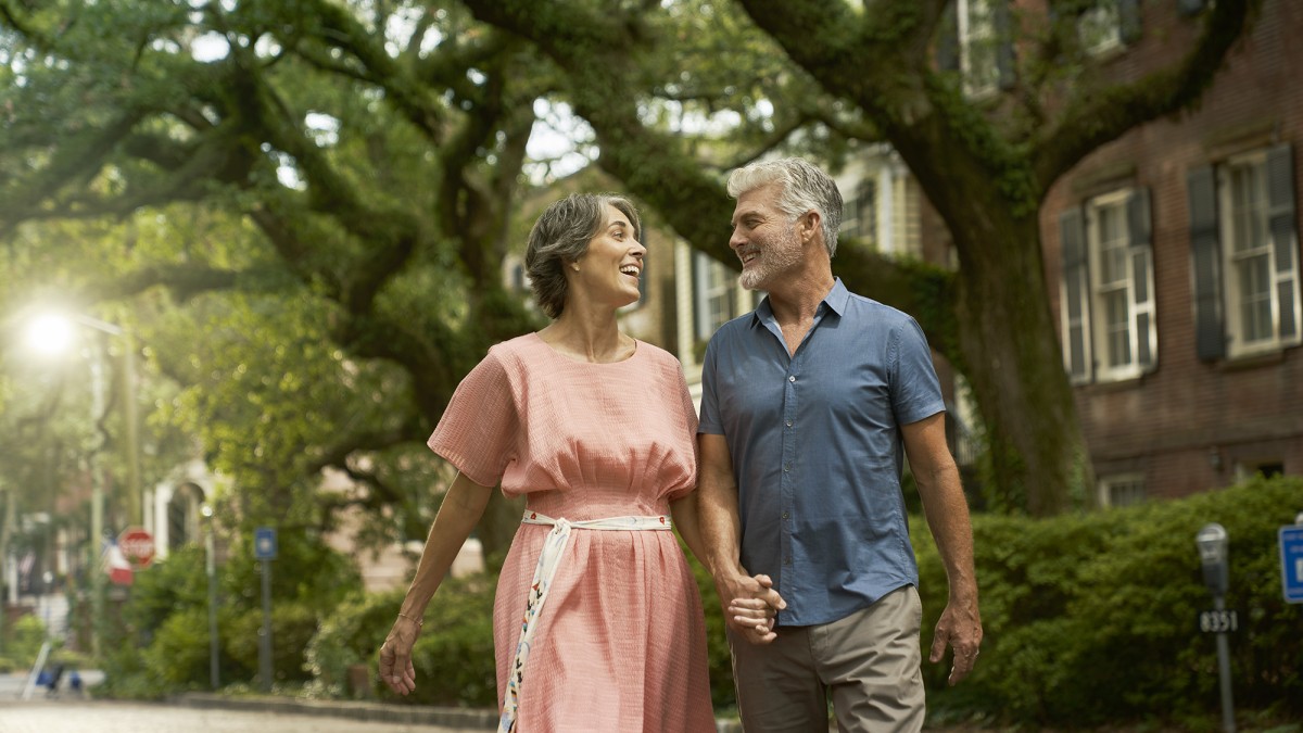 couple walking down jones street