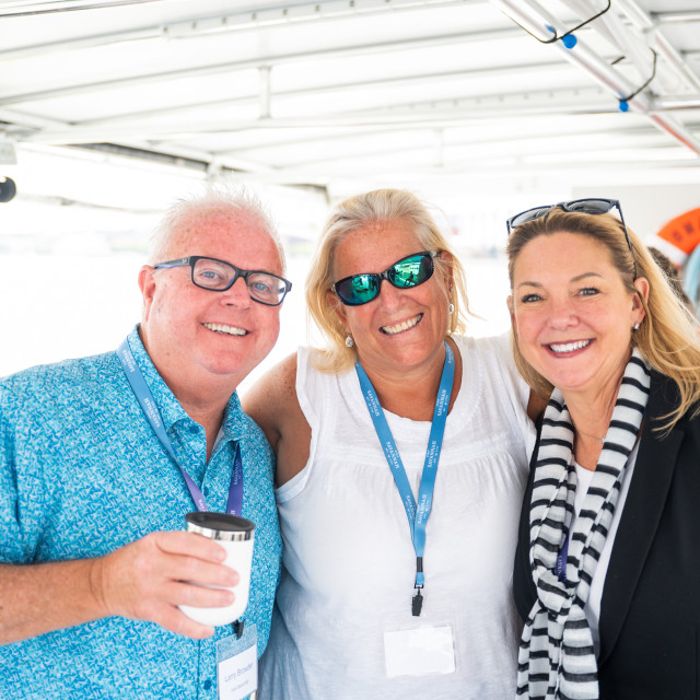 sales team on boat