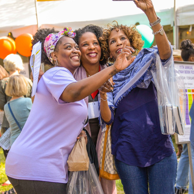 Three women taking a selfie at the Savannah Book Festival