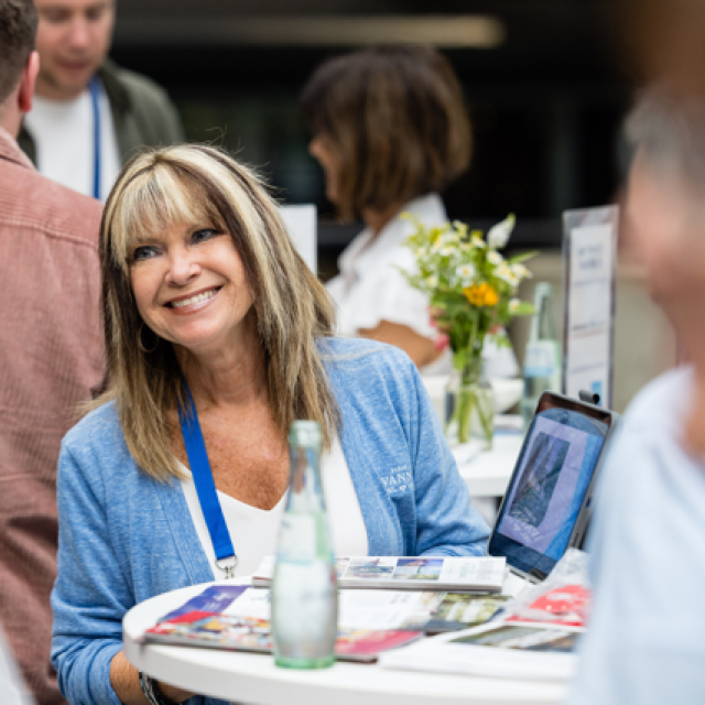 sales mindy shea smiling with guests
