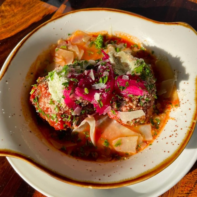 Baked meatballs with marinara.