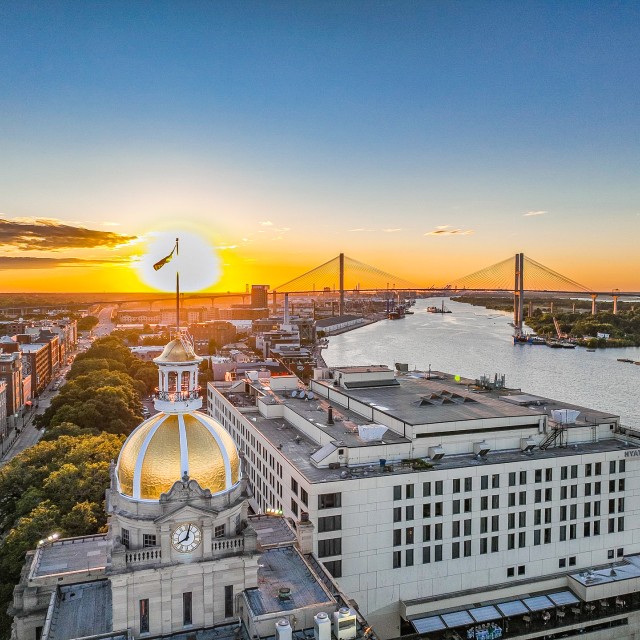 An aerial view of Savannah City Hall at sunset.