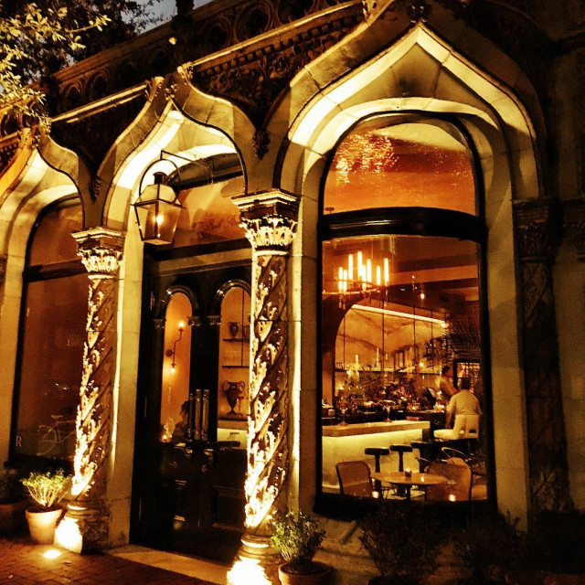 An evening outdoor picture of Artillery Bar in Savannah, GA.