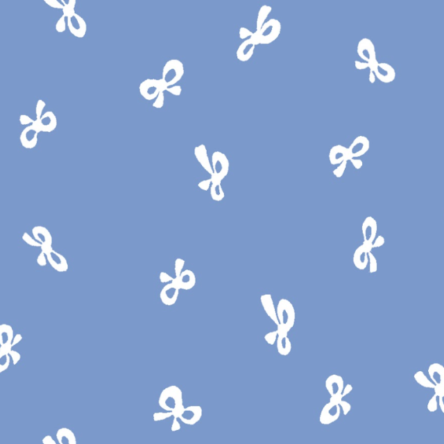 A periwinkle blue background with small white bow fabric.