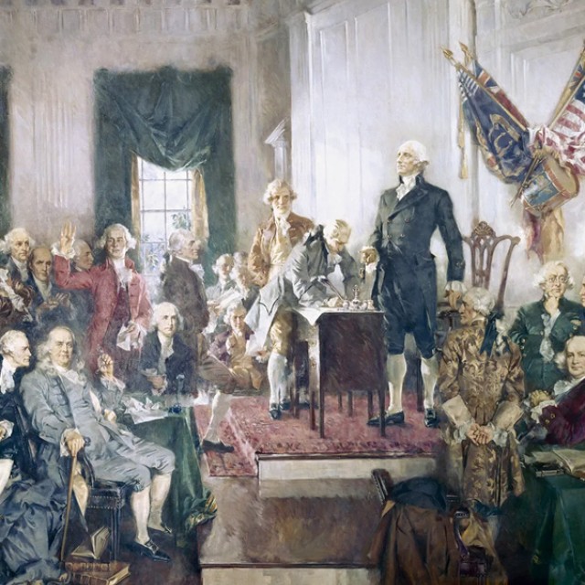 A painting of the founders of the American Constitution.