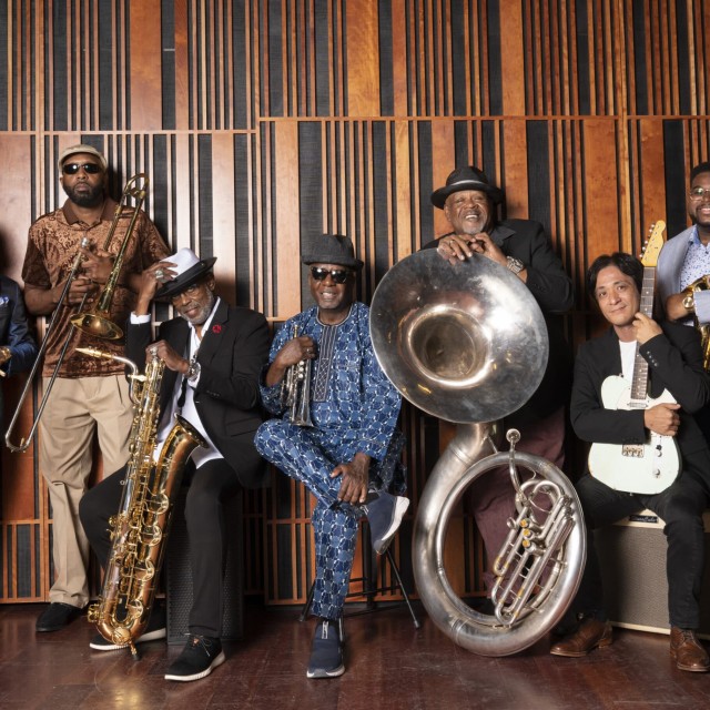 A mulit-member brass band.