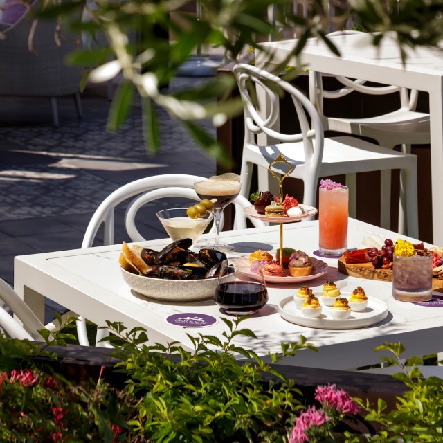 A beautiful outdoor brunch served at Myrtle & Rose Rooftop Bar in Savannah, GA.