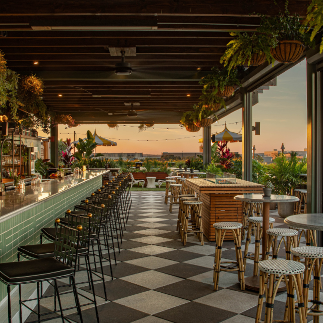 Perry Lane Hotel’s Peregrin Rooftop Bar at sunset.