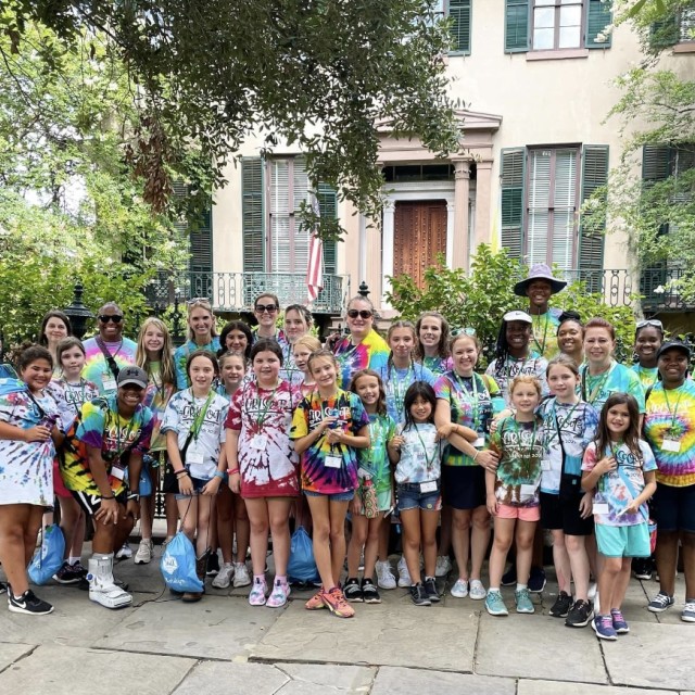 Girl Scout troop gathered outside the Andrew Low House Museum in Savannah.