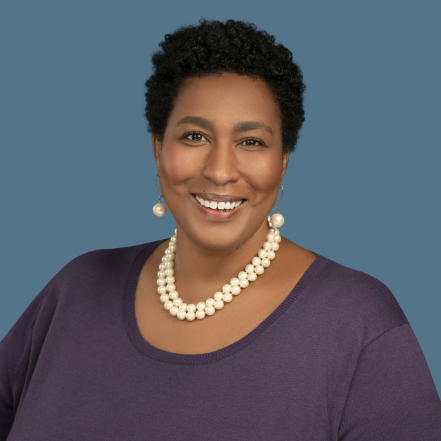 A professional headshot of Erica Backus, VP of Communications at Visit Savannah.