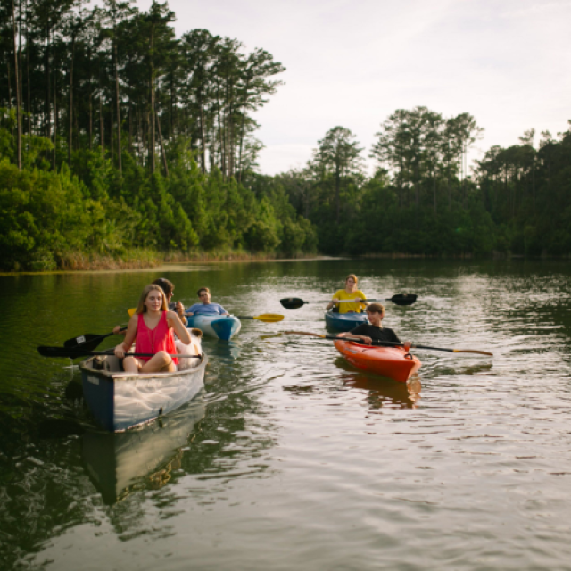 Family kayaking at Waterways.