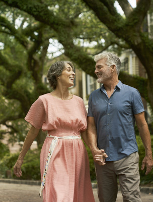 couple walking down jones street
