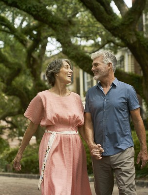 couple walking down jones street