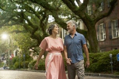 couple walking down jones street