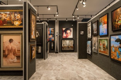 A retail gallery with walls of fine art.
