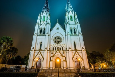 An eerie scene of a church at night.