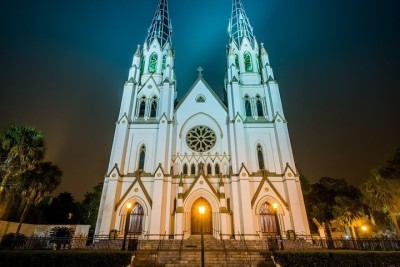 An eerie scene of a church at night.