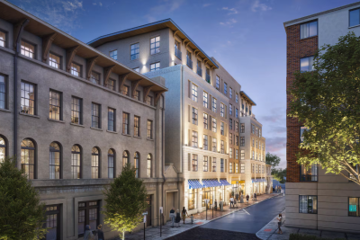 Exterior rendering of Tempo by Hilton Savannah Historic District, showing a modern mid-rise hotel with illuminated windows, street-level storefronts, and pedestrians walking along a city street at dusk.