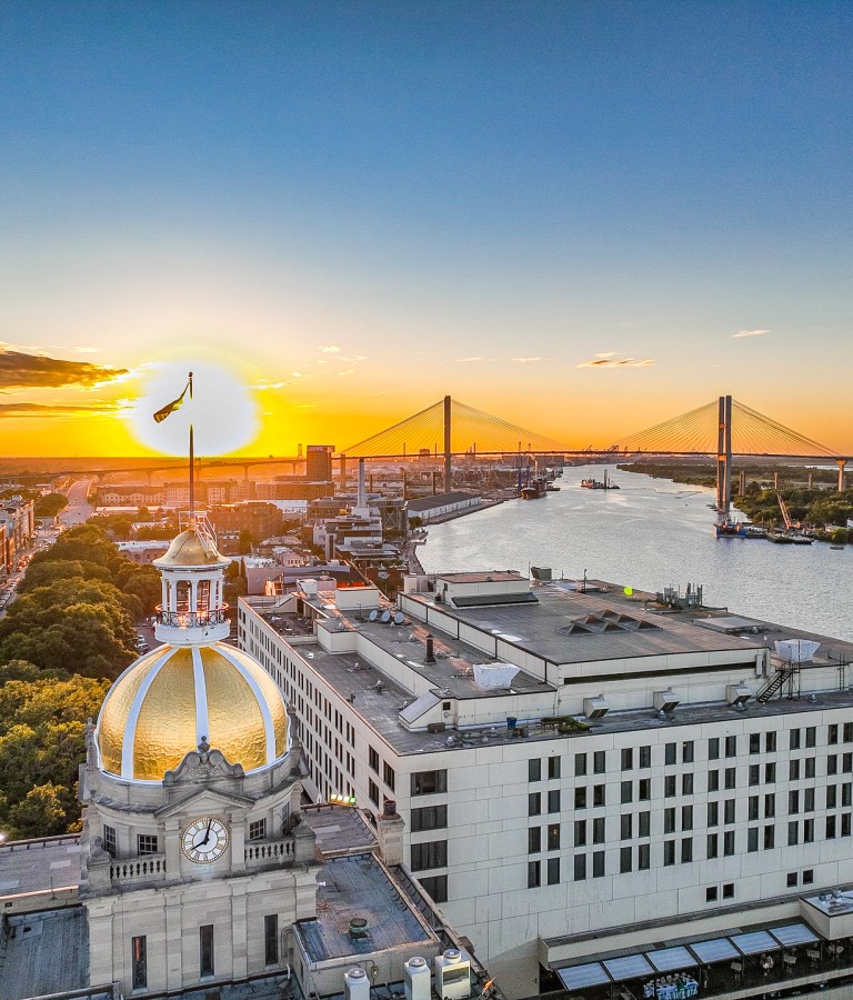 An aerial view of Savannah City Hall at sunset.