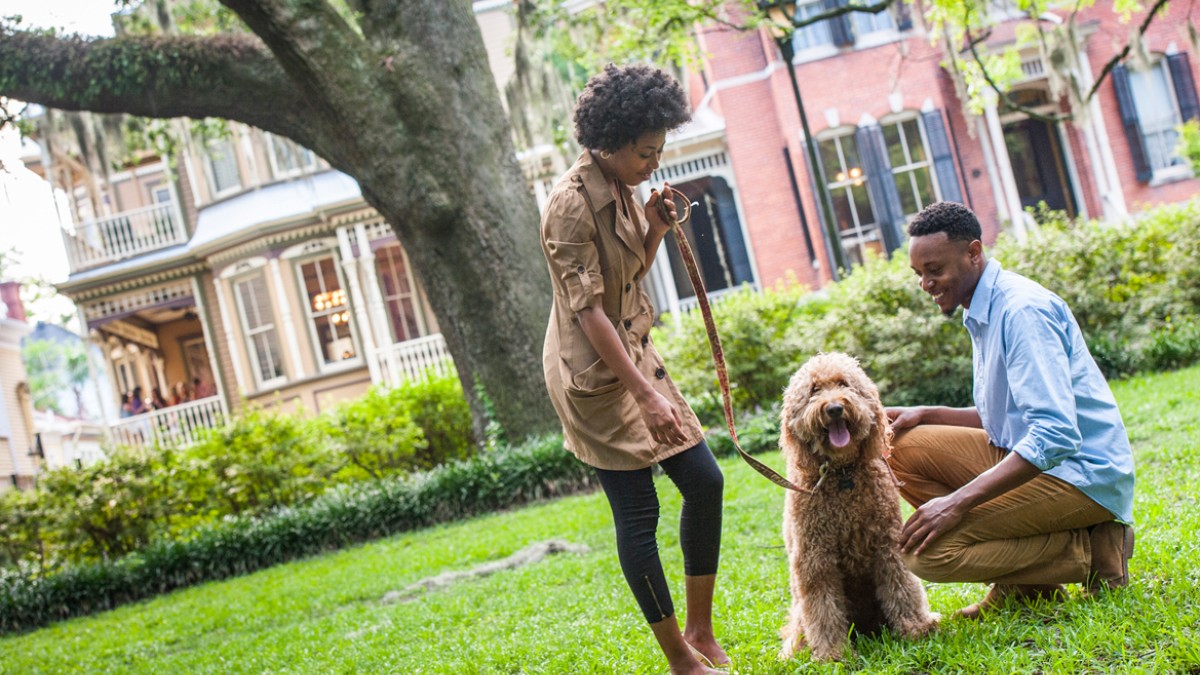 Couple in Forsyth Park with dog