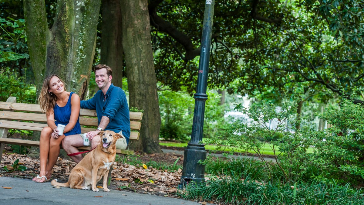 Couple with dog in Forsyth Park