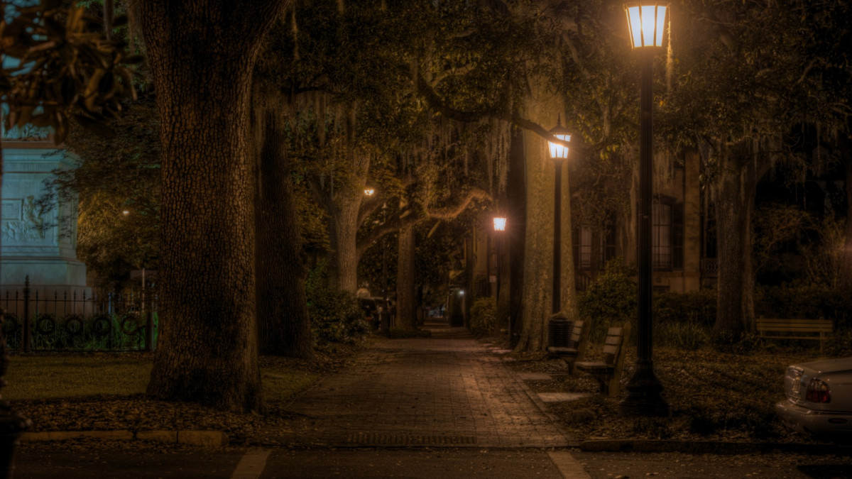 Monterey Square at night with ghostly vibes.
