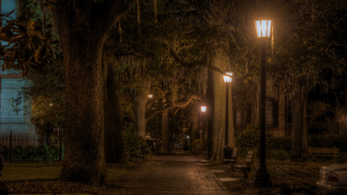 Monterey Square at night with ghostly vibes.