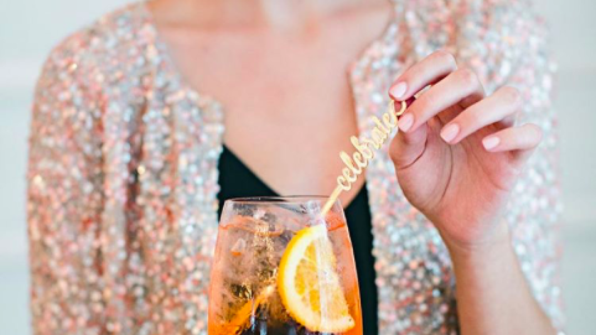Woman pictured with cocktail at Pacci Italian Restaurant