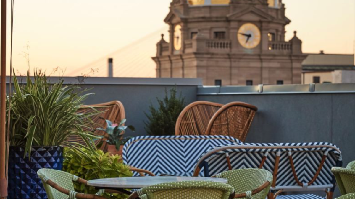 Pendant Terrace & Bar rooftop bar with view of city hall’s gold dome