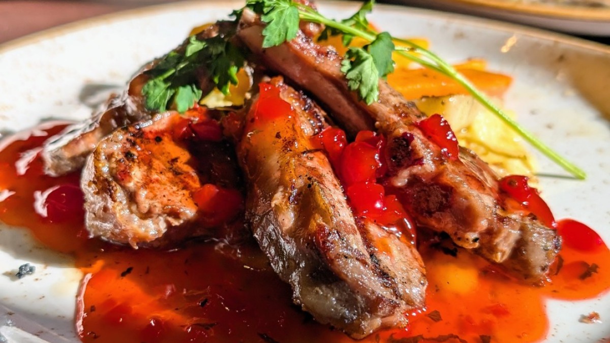 A plate of food sitting on a table.