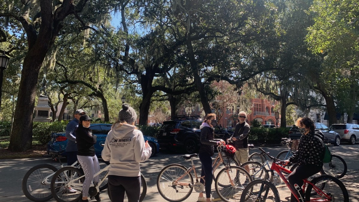 A group of people on a bike riding tour