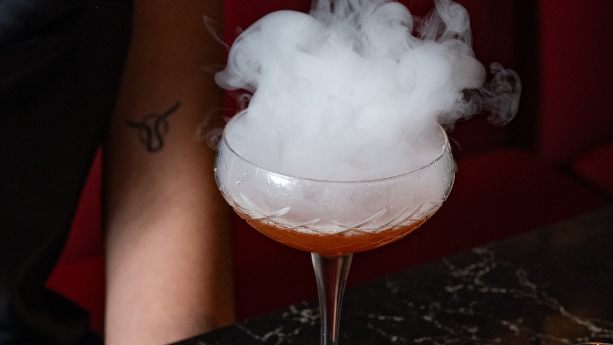 Smoke coming from a cocktail drink.