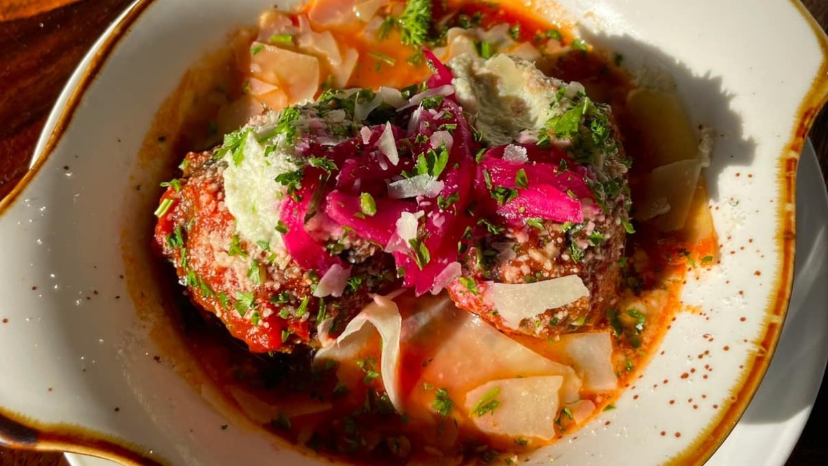 Baked meatballs with marinara.