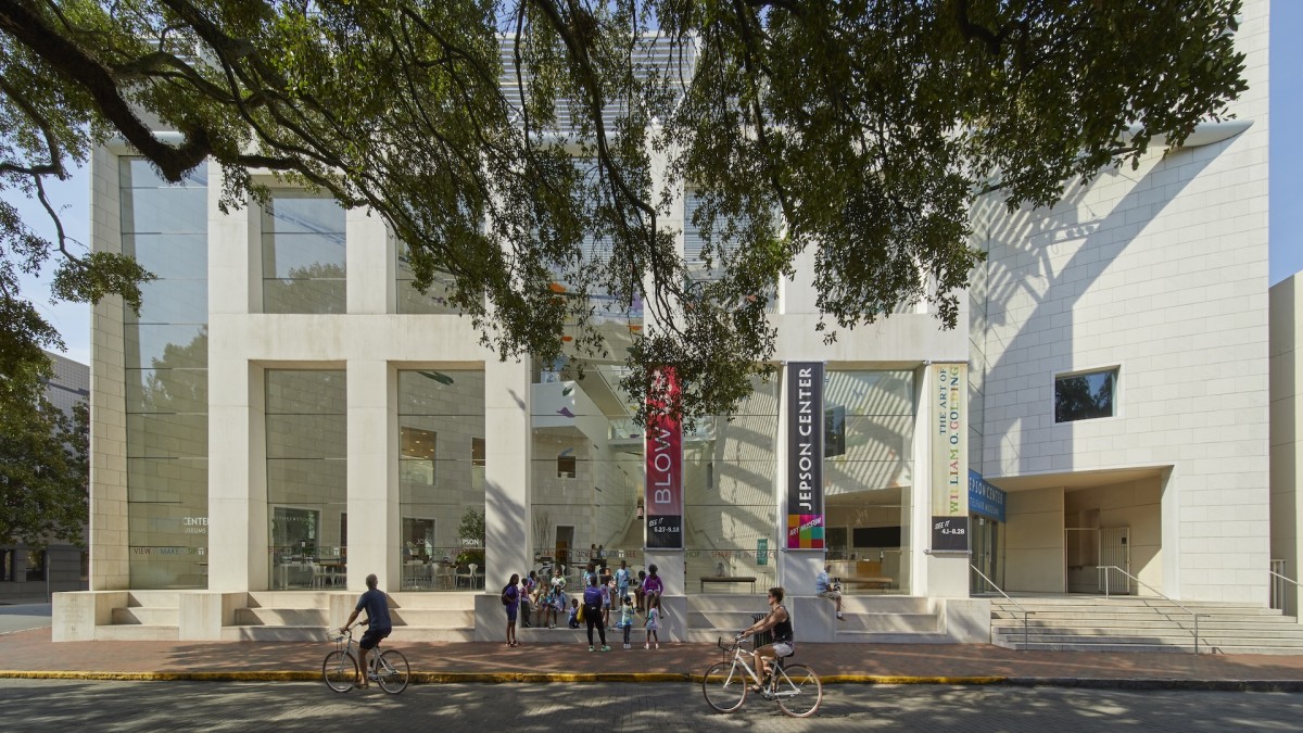 Outdoor front entrance of an all glass modernized museum.