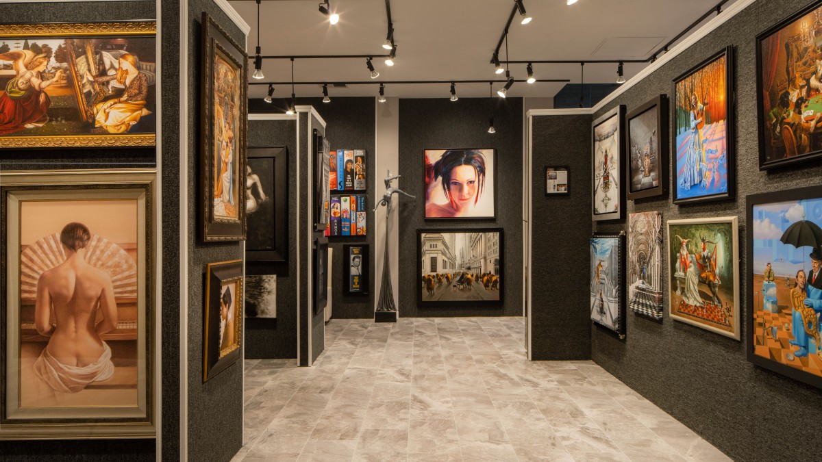 A retail gallery with walls of fine art.