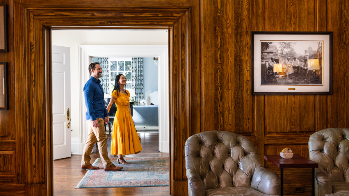 A couple walking through a potential home.