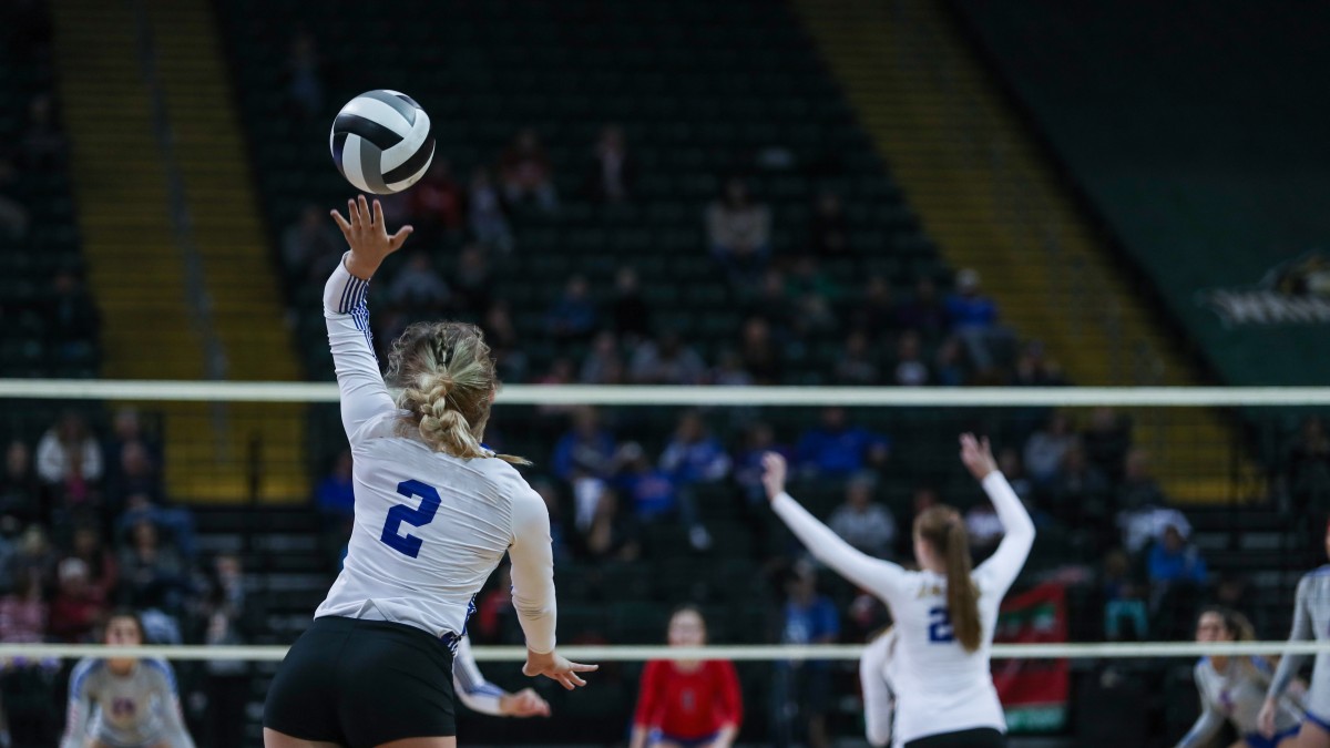 volleyball game player serving