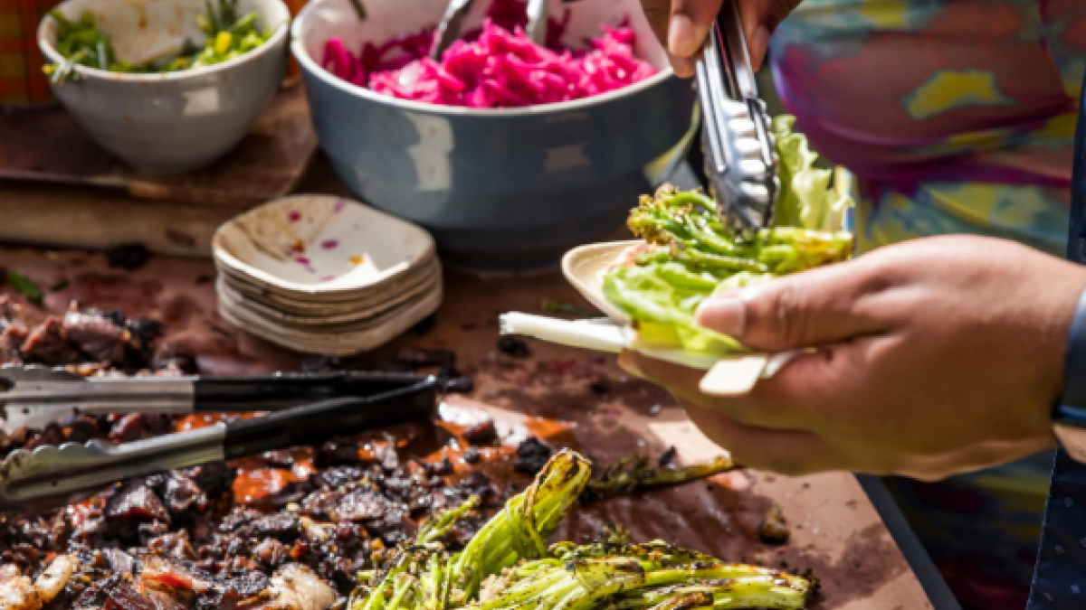 A table spread of grilled food.