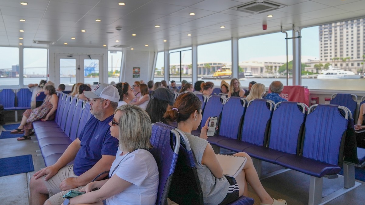 The interior seating of a large capacity boat ferry.