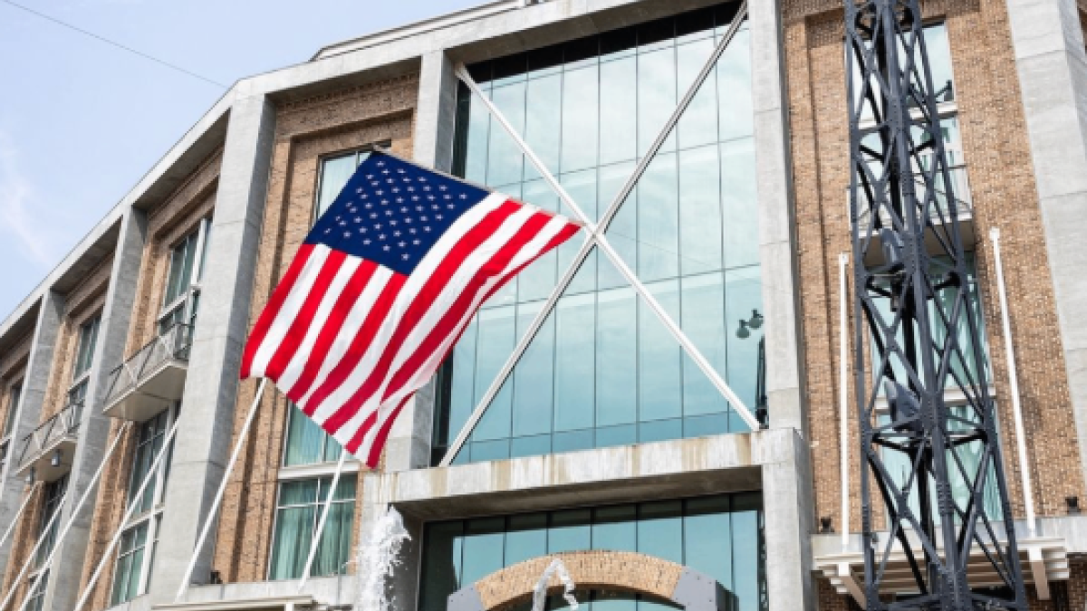 Plant Riverside District’s American flag