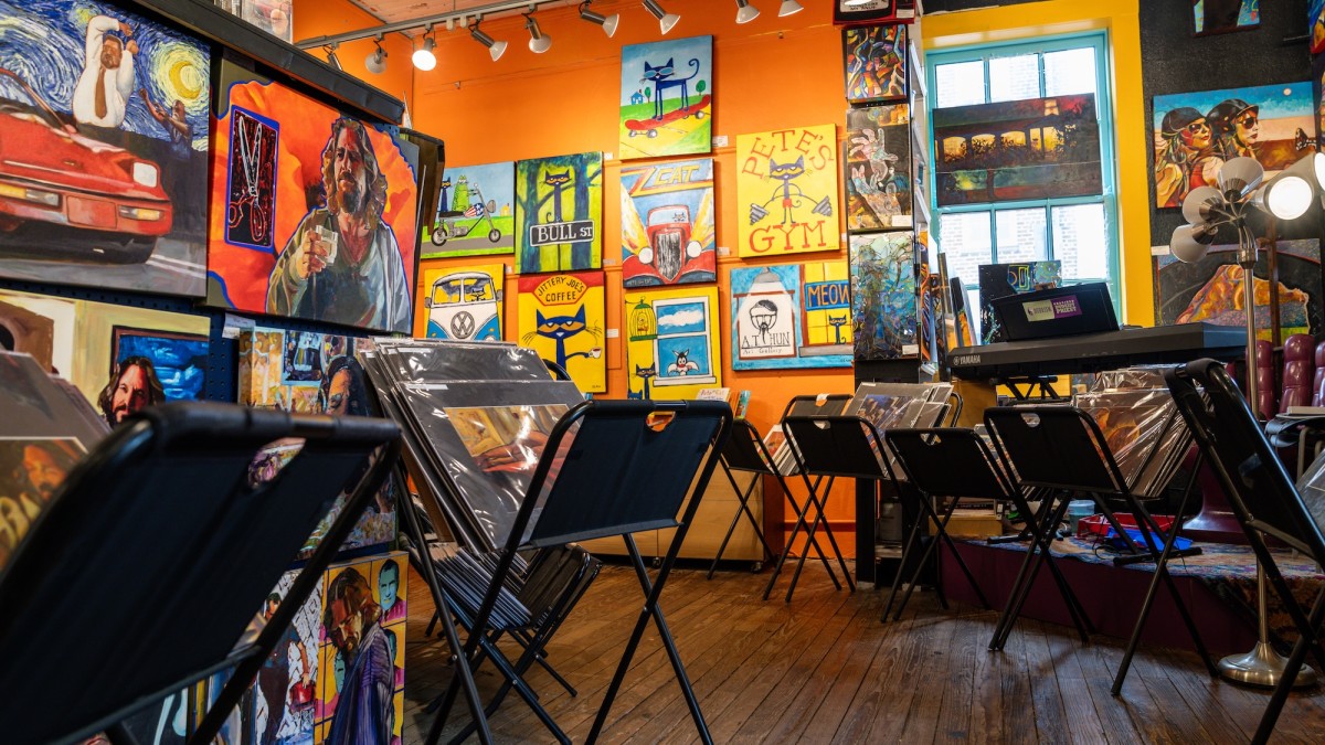 A local art gallery filled with canvas paintings.