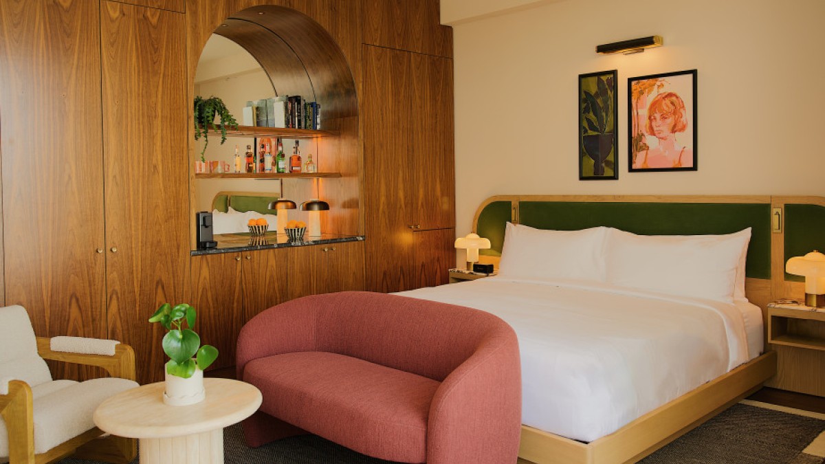 A modern hotel guest room with 60’s inspired decor.