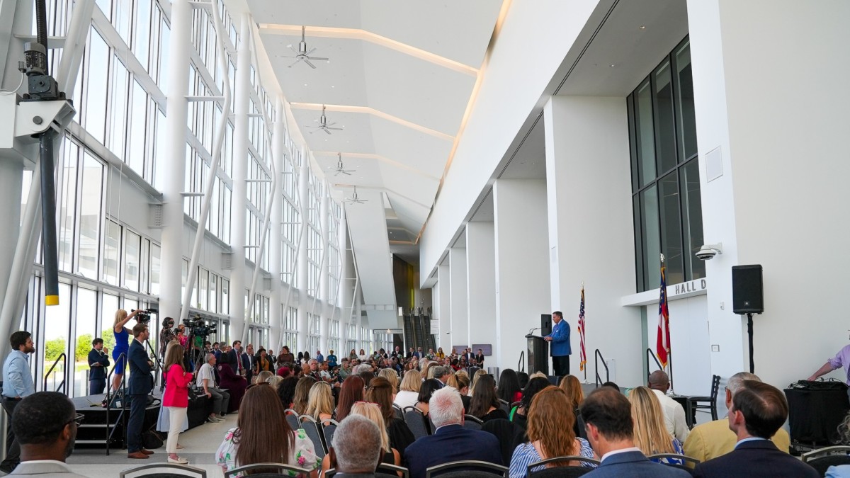 A large group inside the Savannah Convention Center.