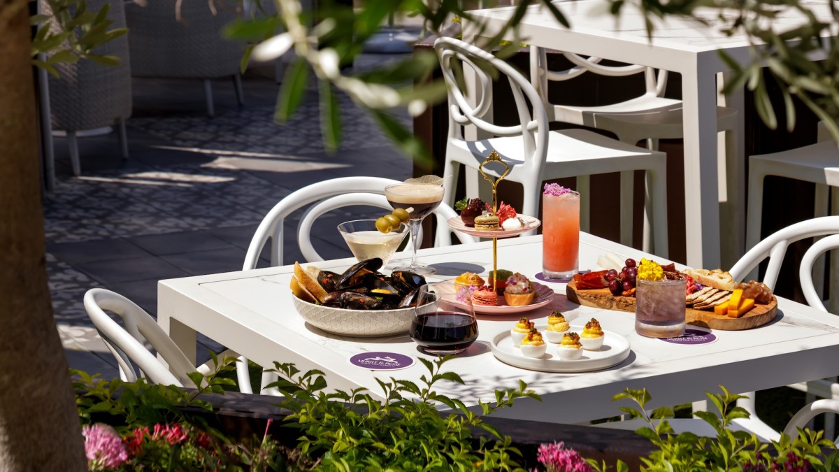 A beautiful outdoor brunch served at Myrtle & Rose Rooftop Bar in Savannah, GA.