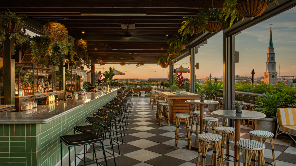 Perry Lane Hotel’s Peregrin Rooftop Bar at sunset.