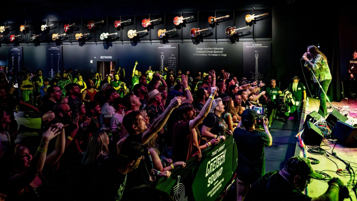 A crowd of people enjoying live music.