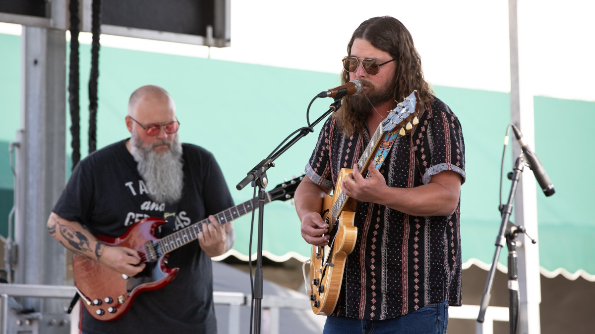 A live band plays outdoors at Savannah's City Market.