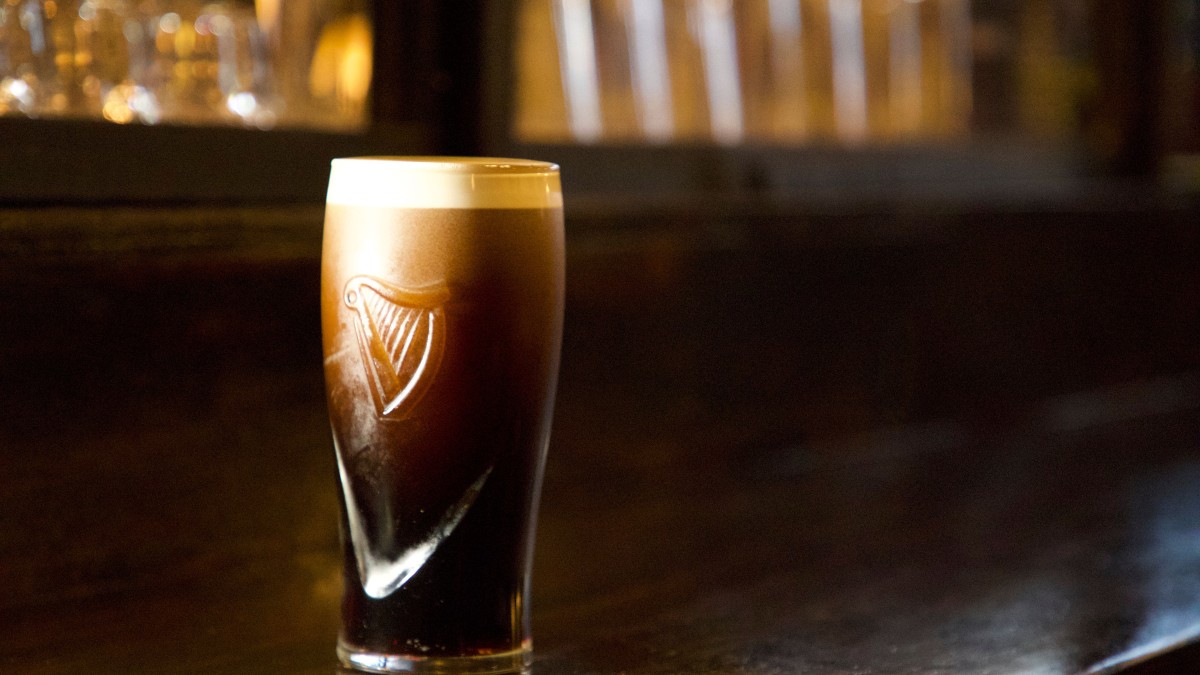 A Guinness at a pub in Savannah, Georgia A beer on a pub bar in Savannah, Georgia