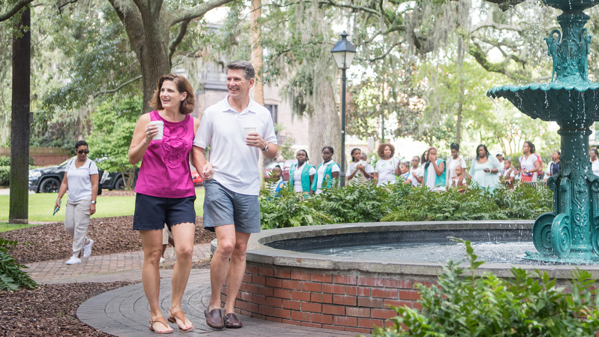 hero-couple-walking-lafayette-square-drinks-outdoor-fountain.jpg