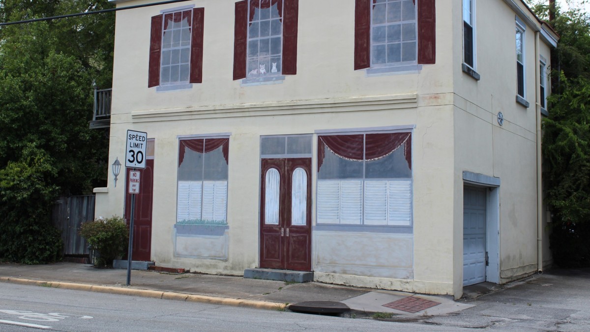 A private residence on Price Street is painted with a mural. 